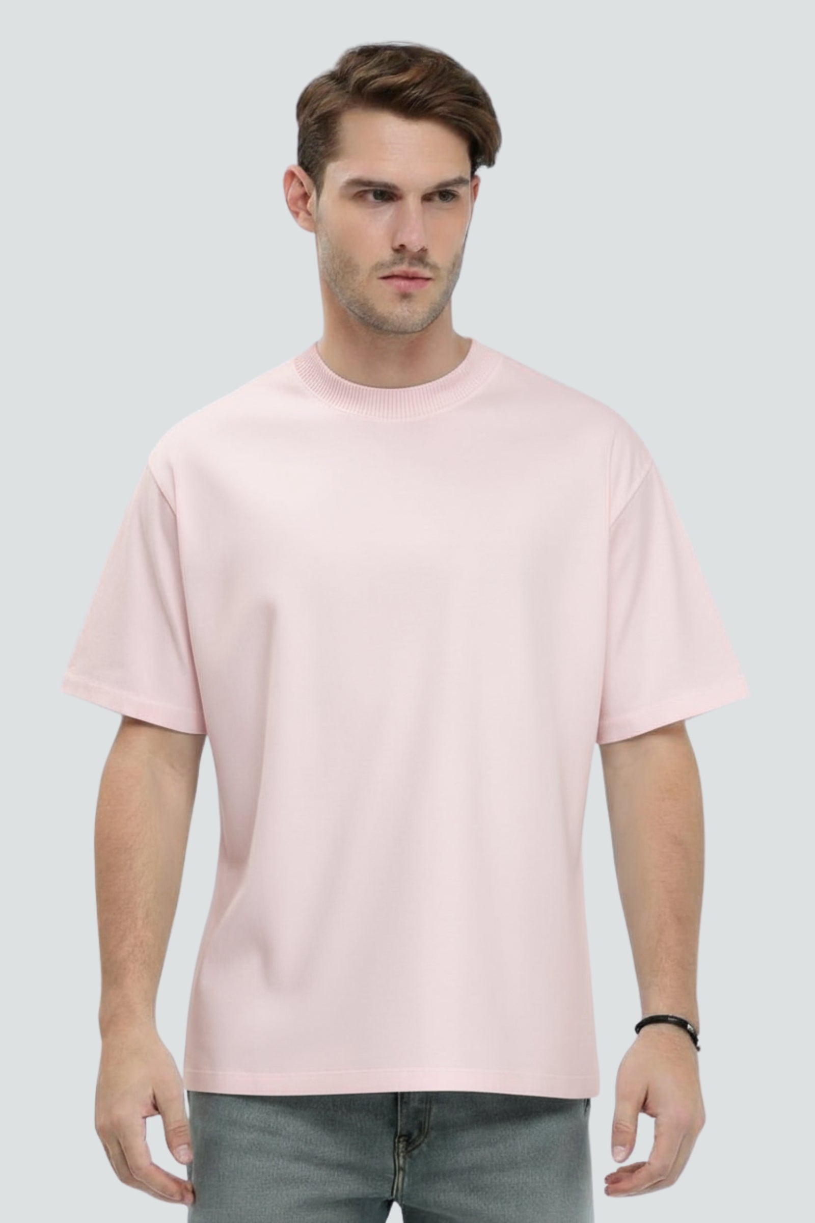 Light pink heavyweight oversized t-shirt, 240 GSM cotton, Lycra ribbed neck, front view.