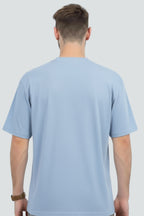 Light blue heavyweight oversized t-shirt, 240 GSM cotton, Lycra ribbed neck, back view.