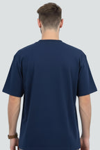 Navy blue heavyweight oversized t-shirt, 240 GSM cotton, Lycra ribbed neck, back view.